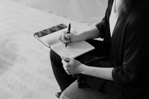 Daphne writing in a journal